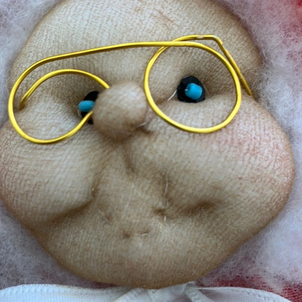 Vintage Mrs. Claus Face Ornament with‎ Gold Glasses and blue eyes, red bonnet